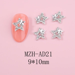 Detail of 9x10mm hollow star nail art charms with silver base and white rhinestones