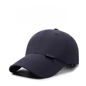 Detailed close-up of dark blue breathable sun hat with quick-dry fabric and air vents