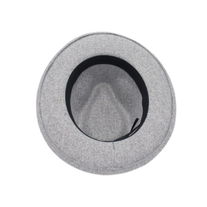 Detail of the grey wool felt fedora hat interior with a black inner sweatband