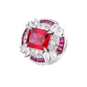 Adjustable silver ring featuring a large rectangular red gemstone with brilliant accents