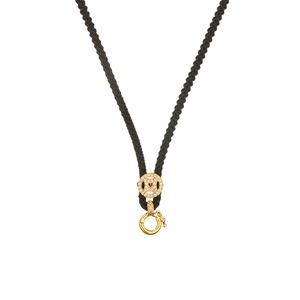 Detail of black braided necklace cord with gold-plated lobster clasp and crystal-inlaid pendant