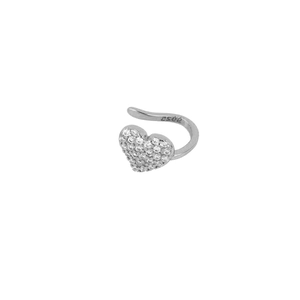 Macro detail of silver S925 heart ear cuff featuring sparkling cubic zirconia stones