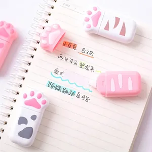 Cute cat paw highlighters on notebook for school stationery and office supply marking