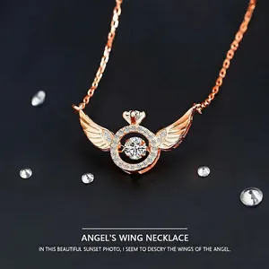 Elegant rose gold Angel Wings necklace featuring a dancing center stone on a minimalist chain