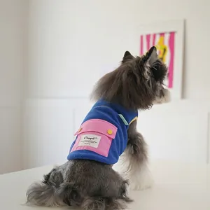 Winter fleece dog vest in royal blue with pink pocket for small medium pets
