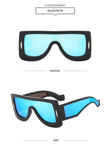 Front and side views of black oversized futuristic tech sunglasses with blue mirrored lens