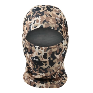 Macro view of breathable camouflage fabric texture on outdoor cycling balaclava mask