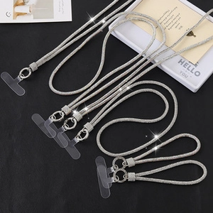 Detail showing 6 silver rhinestone crossbody phone lanyards with transparent clips