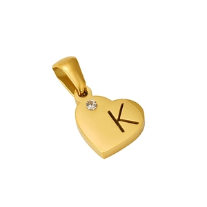 Close-up of heart-shaped gold pendant featuring letter K and a sparkling small diamond