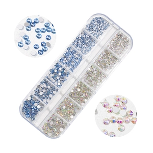 Detail of 12-grid organizer with blue and AB color flatback glass nail art rhinestones