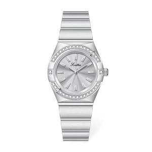 Close-up of a silver ladies watch featuring a diamond bezel and sunburst dial detail