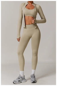 Three-piece beige seamless yoga set with ribbed texture and high-waist fitness leggings