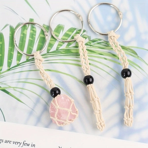 Handmade woven stone cage necklace with adjustable cotton cord and natural pink crystal
