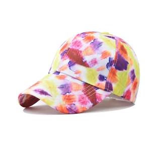 Detail of the multi-color tie-dye gradient cotton baseball cap with 45-degree side view