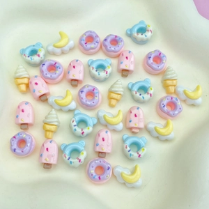 Miniature resin charms including colorful ice creams and donuts for DIY nail art and crafts