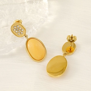 Vintage gold-plated geometric earrings featuring yellow natural stones and small diamonds