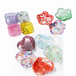 Handmade resin jewelry trays with natural crystals and glitter in multiple shapes