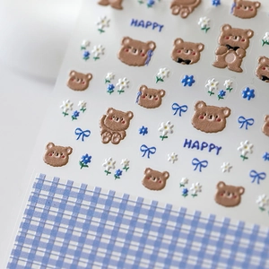 Japanese style 3D embossed nail stickers featuring blue floral and brown bear designs
