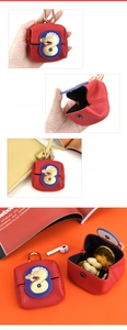 Detail of red microfiber leather mini pouch with number 8 snake pattern and metal clip
