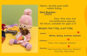 Detail of pink knitted hat and scarf set with 3D bunny decor and soft inner lining