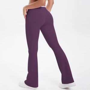 High-waisted dark purple flare yoga leggings with slim fit and elastic athletic fabric