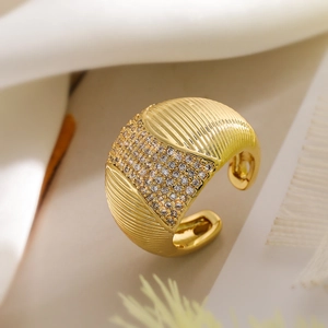 Gold plated open ring with geometric zircon inlay and textured striped metal finish