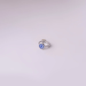 Minimalist silver smiley face earring with blue enamel finish for a stylish look
