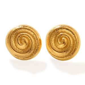 Macro shot of 18k gold plated geometric star stud earrings with spiral textured finish