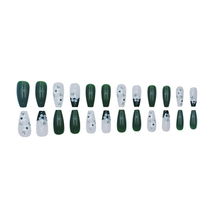 Green and white floral press-on nails set with long trapezoid shape and polka dot design