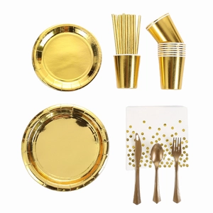Gold disposable party dinnerware set including paper plates, cups and gold polka dot napkins
