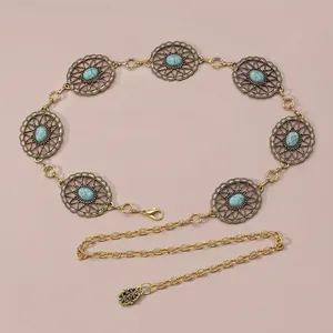Bohemian gold waist chain featuring intricate hollow disks with turquoise stone inlays