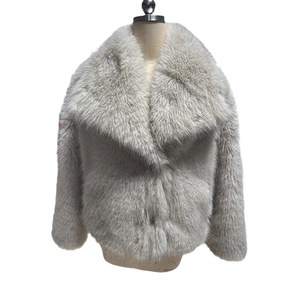 Elegant solid color short faux fur jacket with lapel collar on a mannequin torso