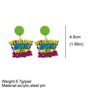 Detail view of colorful acrylic pencil earrings with Welcome Back to School text
