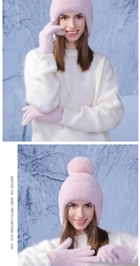 Close-up of soft pink winter knit hat and matching gloves with fluffy faux fur texture