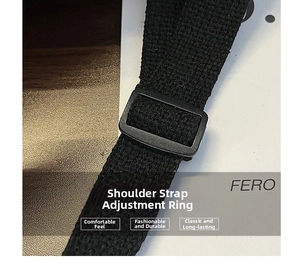 Detail of black woven shoulder strap with adjustable plastic buckle for quilted puffer bags