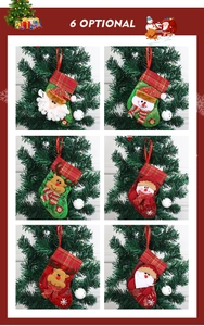 Detailed view of six decorative Christmas stockings with Santa, Snowman and Elk designs