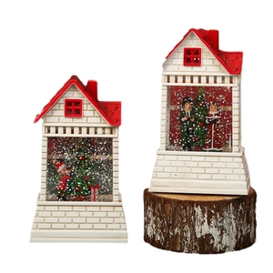 Luminous Santa house lantern with snow globe effect and festive Christmas decorations
