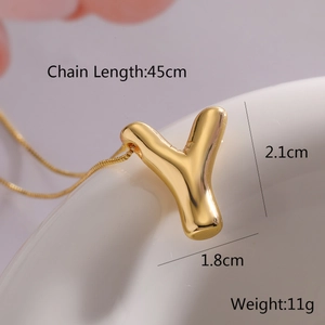 Close-up of golden balloon Y letter pendant with chain length 45cm and 11g weight