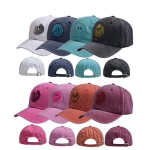 Distressed washed cotton baseball caps with sequin smiley face in various colors