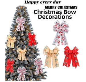 Close-up of three Christmas ribbon bows with Santa and tree prints for holiday decor