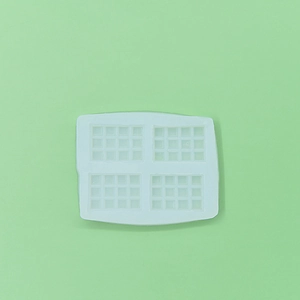 White 4-slot silicone chocolate mold with 48 mini square grids for DIY baking and crafts