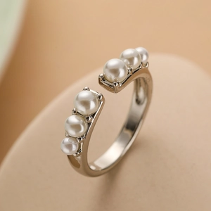 Minimalist silver geometric open ring featuring multiple elegant white pearls for women