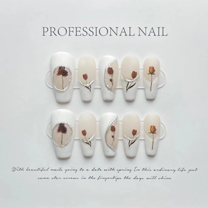 Handmade white press-on nails with dried rose patterns and silver platinum gel accents