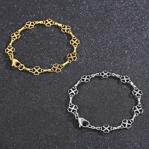 Minimalist four-leaf clover bracelet in gold and silver stainless steel finishes
