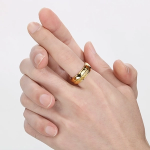 Minimalist hammered texture gold titanium steel ring shown on a hand model