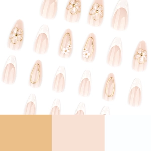 Short almond press-on nails with 3D white flowers and French tip design on nude base