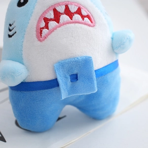 Fierce shark plush keychain with creative blue embroidery and soft fabric texture