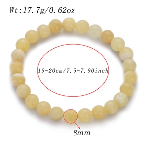 Detail view of 8mm cream natural stone beaded bracelet with size and weight measurements