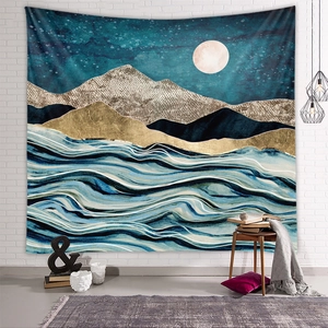 Detail of mountain tapestry showing gold scales and blue waves against a dark night sky