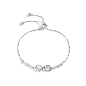 Detail of infinity silver bracelet with cubic zirconia stones and adjustable bolo clasp